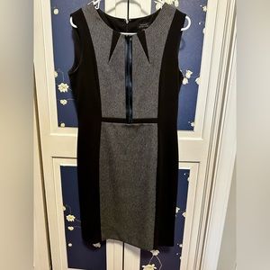 Tahari black and gray dress with faux leather decorative front zipper. Size 10.